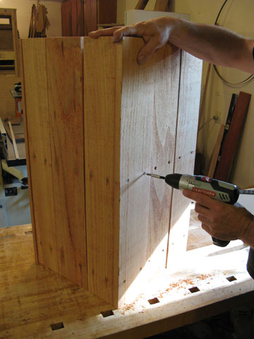 Figure 2: Secure the side boards to the frames with screws driven in from the outside.