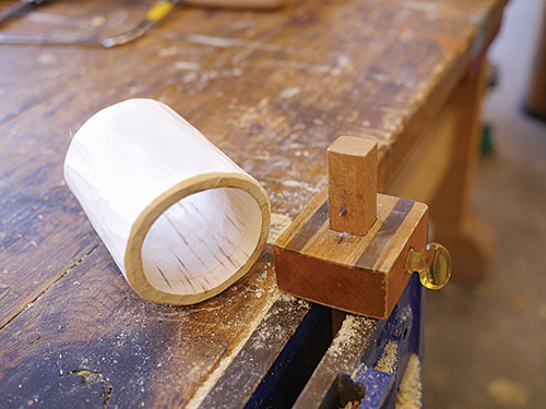 To make the groove for her box bottom, the author found it easiest to put the marking gauge in a vise