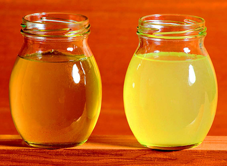Satin or matte finishes (right) contain flatting agent and can look hazy. Gloss finish (left) will remain translucent. Notice how the amber color of the wood behind the jars shows through the gloss finish on the left.