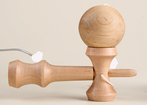 A spiked handle, three cups of varying sizes and a tethered wooden ball are the total of the parts to a kendama game — but the variations of kendama “tricks” go on and on.