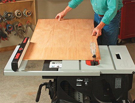 Sliding fence rails extend the saw’s tabletop and fence, which enable it to rip sheet goods or other materials up to 251⁄2" wide. A ledge (not shown) also can be projected out from the fence to support thin materials.