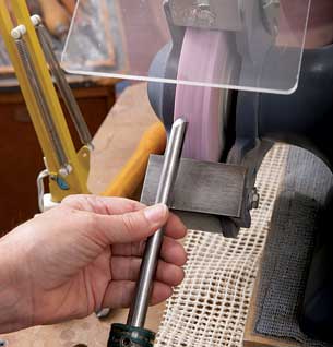 Start with the gouge touching the toolrest, then roll the bevel back and forth to refine the edge.