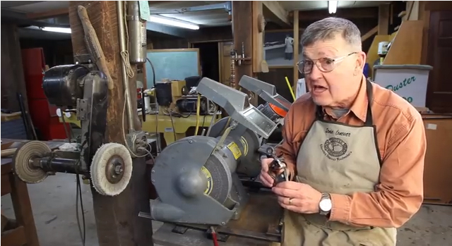 Ernie Conover shows off some of the jigs he uses with his workshop 