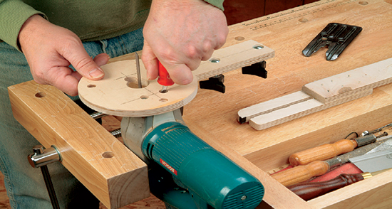 Counterbored holes bored through the circle jig’s round baseplate provide the means for mounting either a jigsaw or a router.