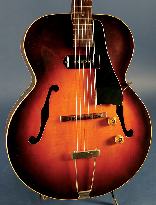 Color added around the edges of a sunburst finish intensifies the curve of an archtop guitar.