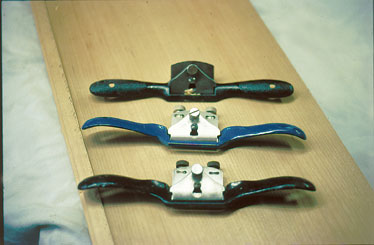 Photo 3: spokeshaves on a board