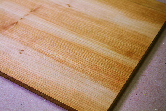 If you don’t overlap your strokes enough when you’re spraying a large, flat surface, you will get alternate wet and dry bands of finish.