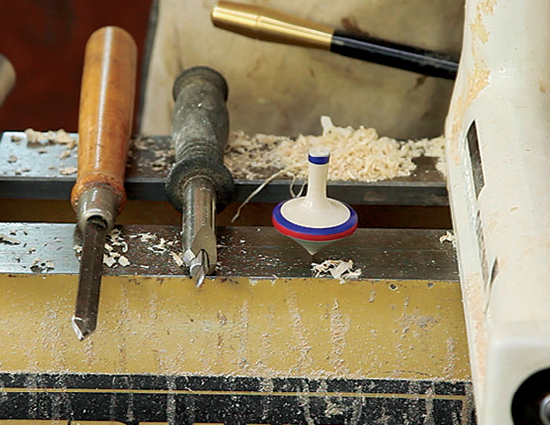 Photo 4: Once the top is parted off the remaining billet, give it a spin to try out your handiwork.