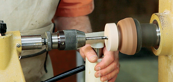 Photo 3: Use a 3/8" Forstner bit in a drill chuck to bore a stopped hole into the disc for the yo-yo’s axle.