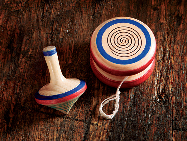 Turning a Yo-Yo or Spinning Top