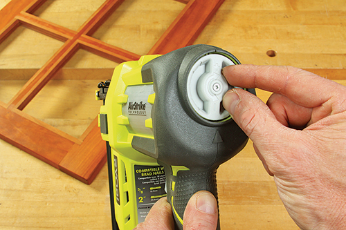 A large dial atop the RYOBI P320 lets you adjust air pressure easily to suit the nailing situation.