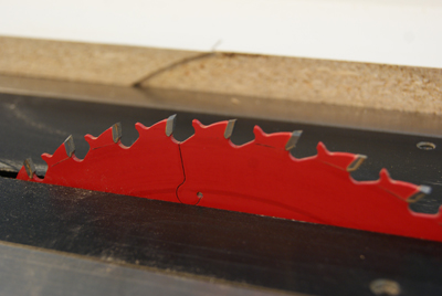 Use a thin-kerf 40-tooth ATB (alternate top bevel) blade. The ATB produces an excellent surface on the jointed edge. The kerf of the blade determines how much you'll be removing with each pass, so thin-kerf is better than full-kerf. That way you're not hogging too much material off.