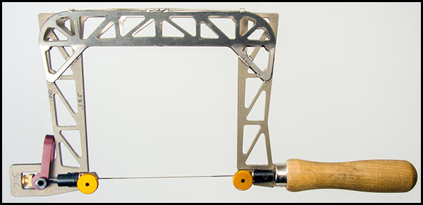 Titanium clearance coping saw