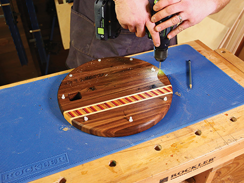 Drilling holes for small cutting board feet