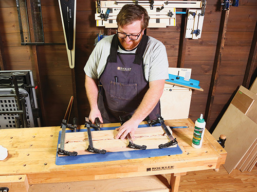 Clamping up strips to make cutting board blank