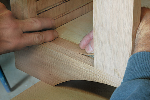 Installing thin veneer strip on entertainment center case edges