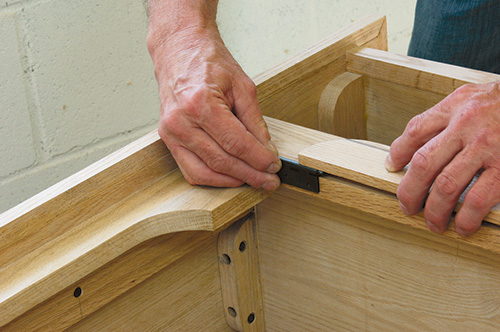 Marking entertainment center case for door hinge installation