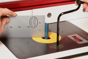 The tool's end scale makes a handy reference for setting router bit and saw blade heights.