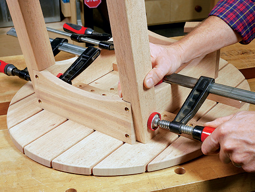 Test fitting leg into Adirondack tabletop and base