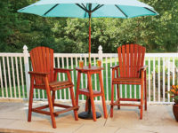 Bar height Adirondack table and chairs on a patio