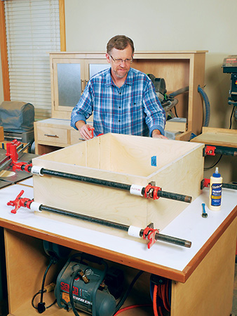 Glue and clamp tool charger casework