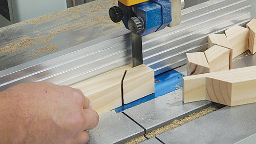 Trim the waste pieces free at the band saw to complete the “lapped” ends of the cross bars. It’s a faster, safer method than using a tenoning jig at the table saw.