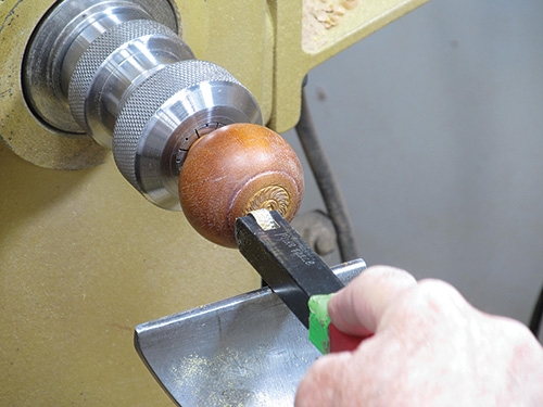 Adding decoration to the base of birdcage awl