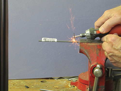 Using a small rotary cutter to trim music wire