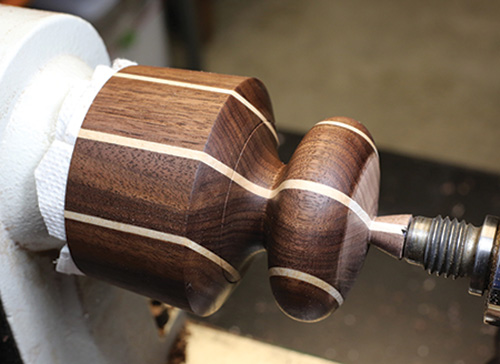 Finishing cut on top portion of biscuit cutter handle