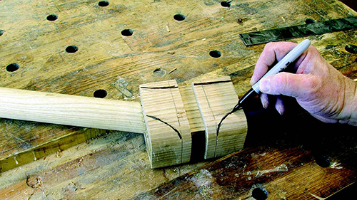 Marking cut angles of chair leg installation block