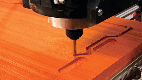 Routing patterns with a bit in a CNC machine
