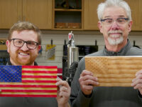 Rob and Nick showing examples of American flag decorations cut on a CNC