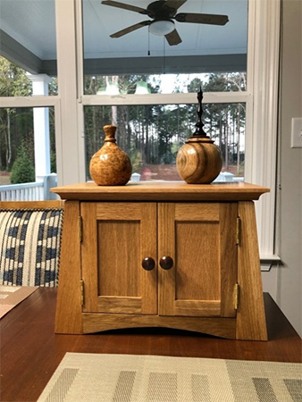 Miniature cabinet and turned vases
