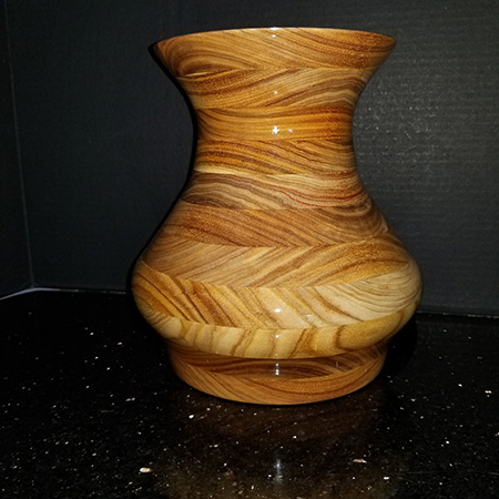 Nine inch vase made with canary wood