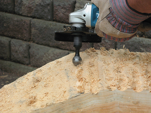Close-up of Arbortech tool with gouge carver installed