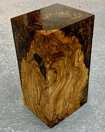 Olive wood blank after being cured with casting resin
