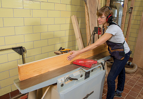 Smoothing cedar lumber with a jointer