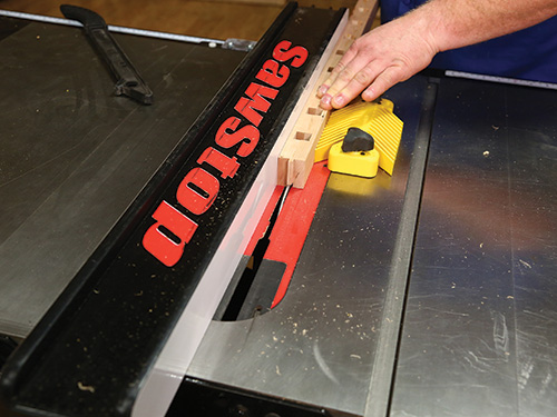 Cutting grooves in rail for panel installation