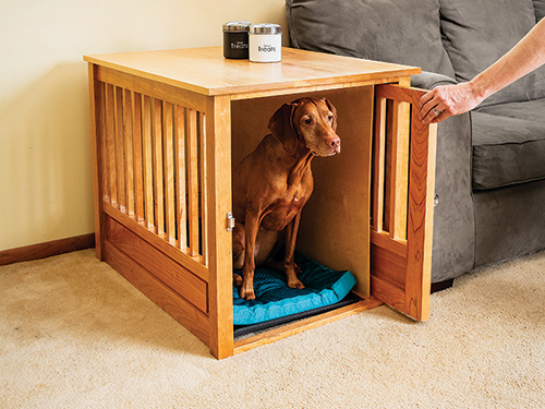 Opening wooden kennel with dog inside