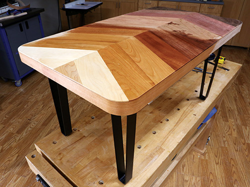 Corner view of chevron table glued-up tabletop