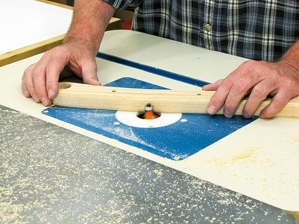 Cutting chair armrest curve with router bit