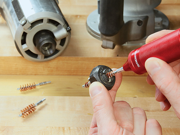 Cleaning a router collet with gun brush