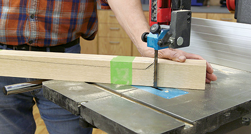 Cutting second part of table leg shape with band saw