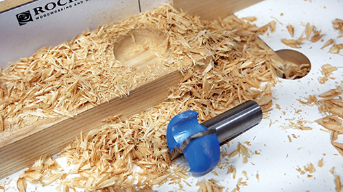 Spoon groove cut with a dish carving router bit