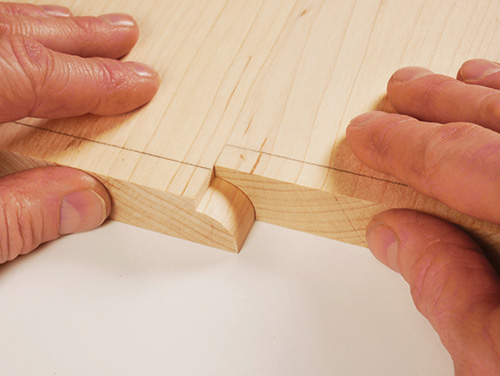 Testing fit of rule joint for drop-leaf table top