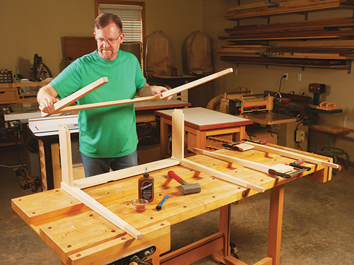 Assembling legs and base frame for drop-leaf table