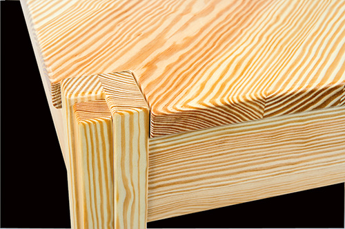 Close up of compact table corner joint