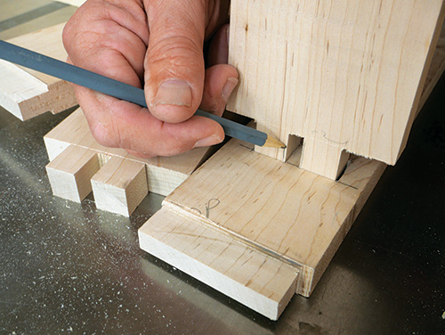 Test fitting mortise-and-tenon joint and marking waste