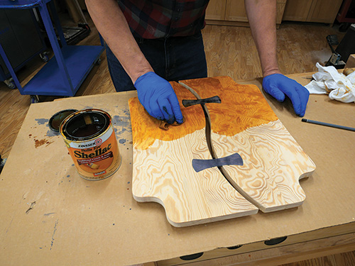 Applying shellac finish to tabletop
