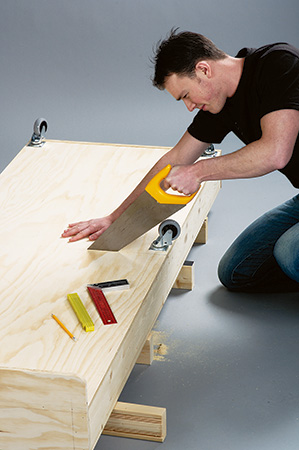 Sawing Convertible coffee table and bed in half
